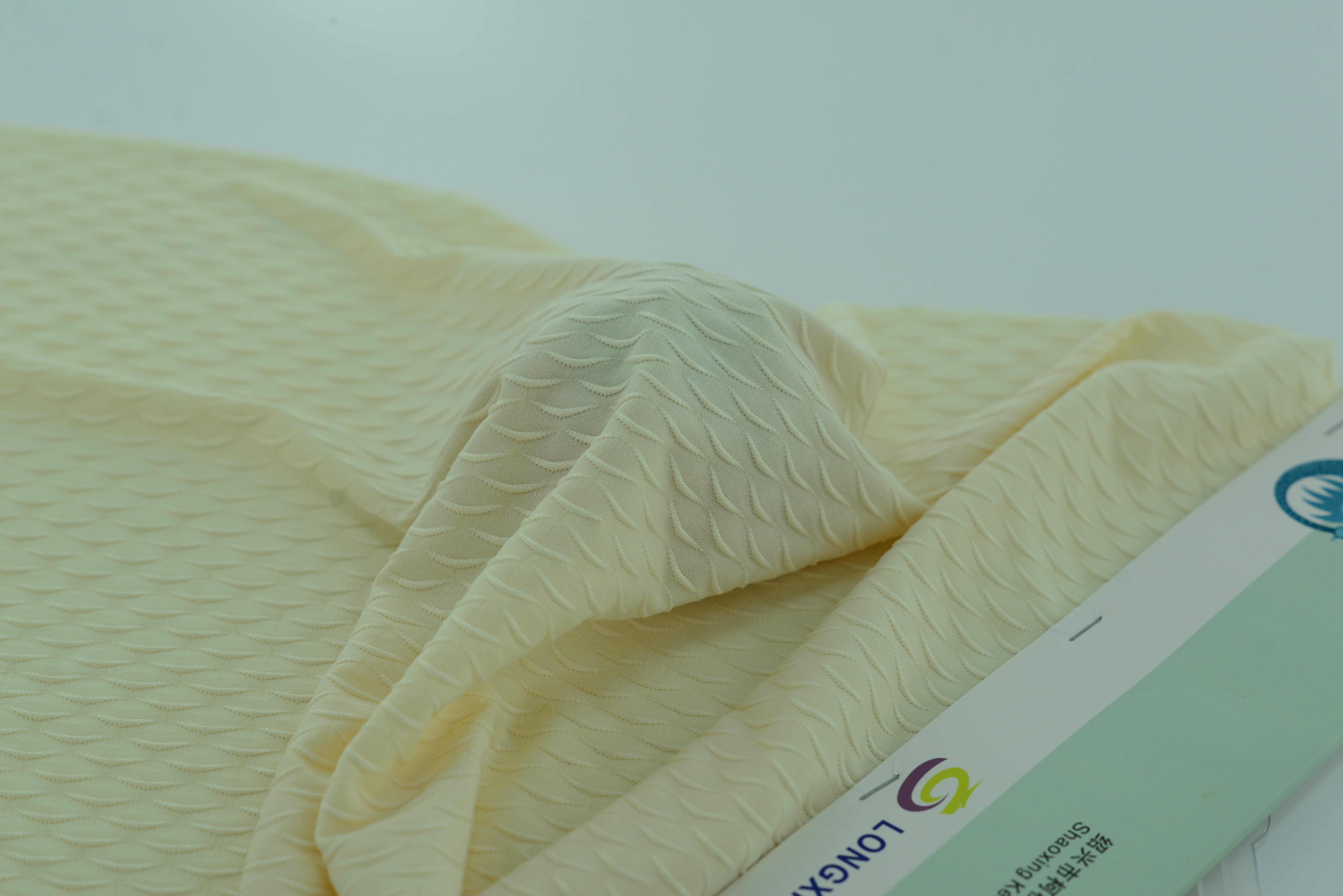 LX-P-16082 SINGLE KNIT FINS SCALE JACQUARD